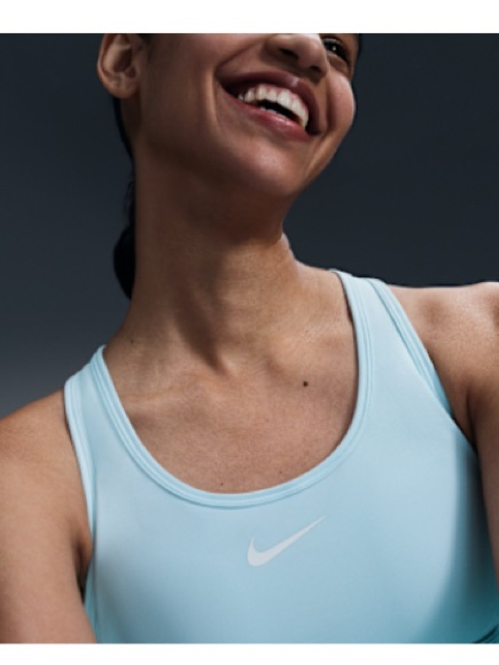 Nike Women’s Pale Blue Racerback Sports Bra with White Swoosh & matching shorts